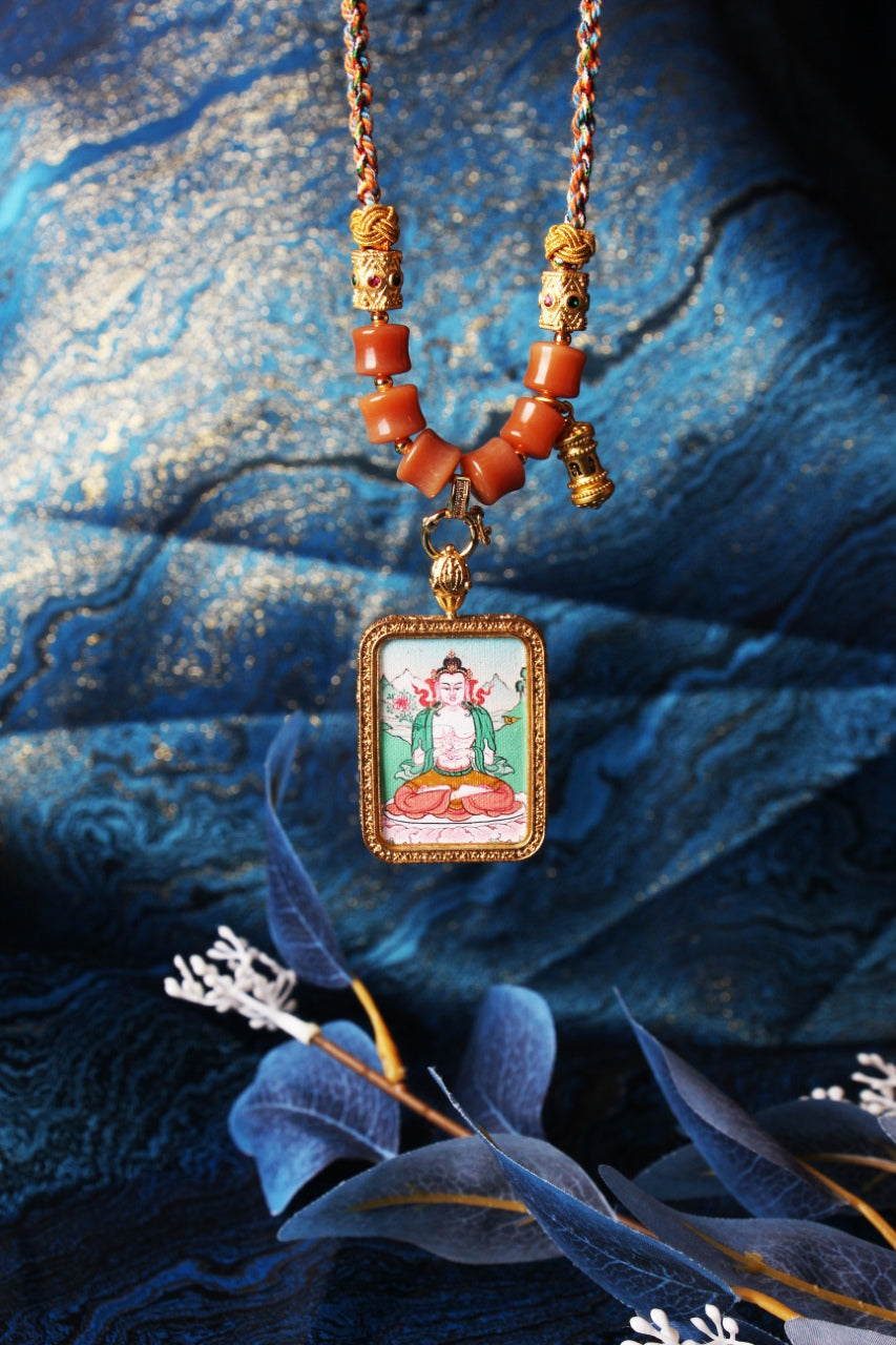 Front view of Mahasthamaprapta Bodhisattva mini thangka pendant focusing on the pendant connector ring, braided cord, bead details, and framed hand-painted artwork