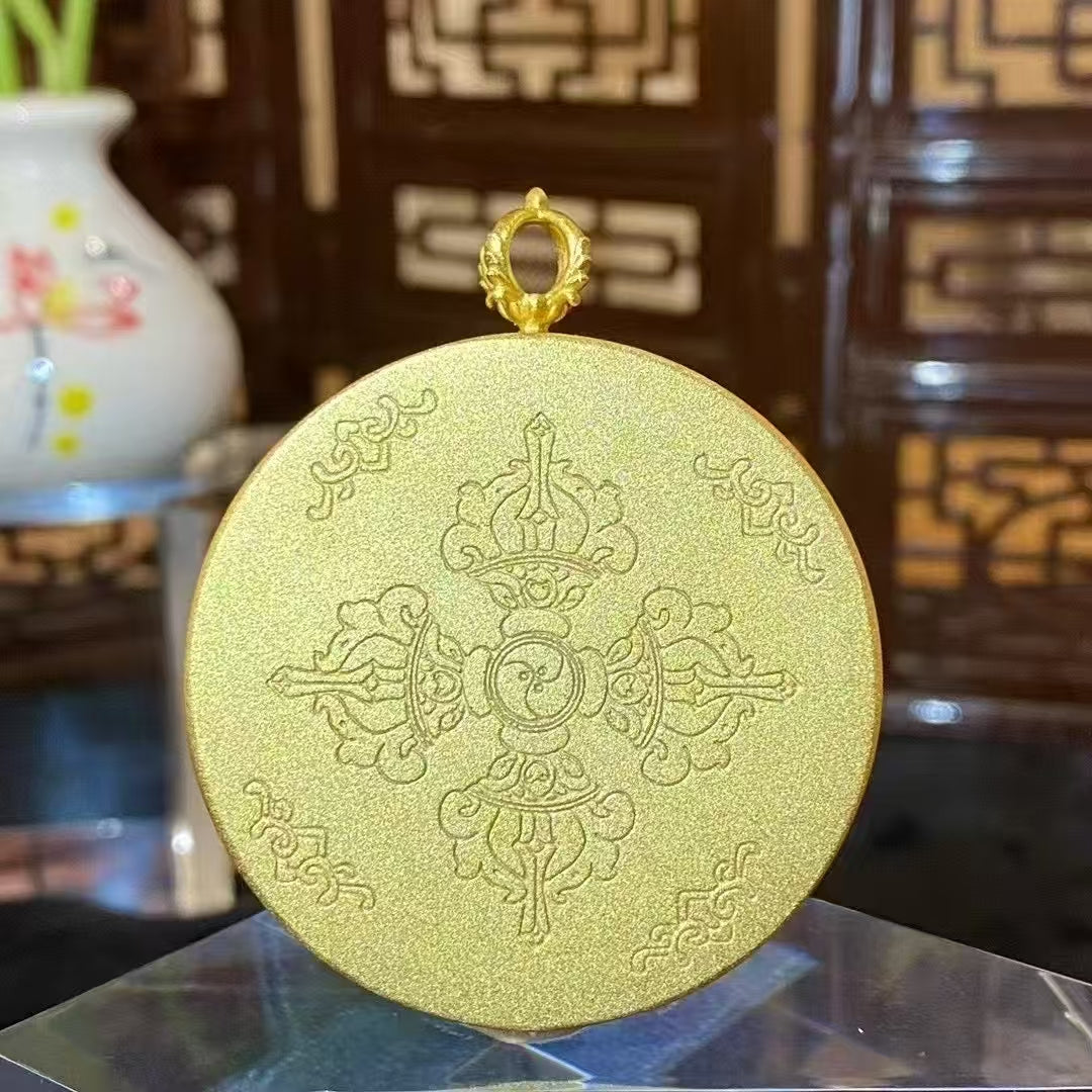 Back view of a Green Tara round copper Ghau box pendant featuring a Double Vajra symbol and sacred seed syllable