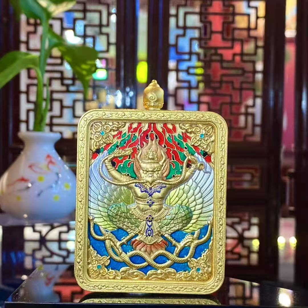 Back view of a Green Tara Gau Thangka pendant featuring a raised Garuda relief symbolizing protection and spiritual power in Himalayan Buddhist tradition