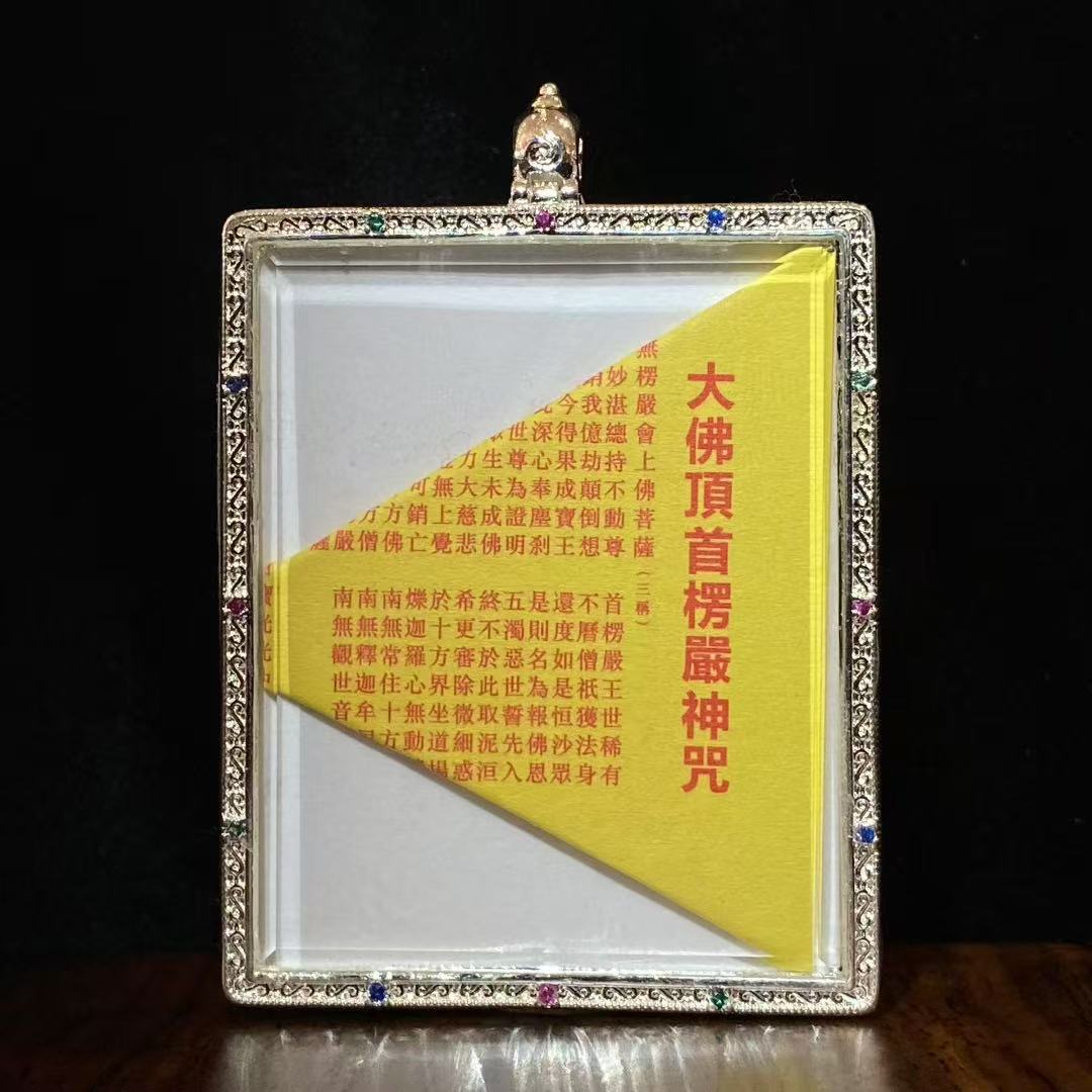 Back view of a hand-painted large Green Tara Gau Thangka pendant containing sacred Buddhist scriptures for spiritual protection and guidance