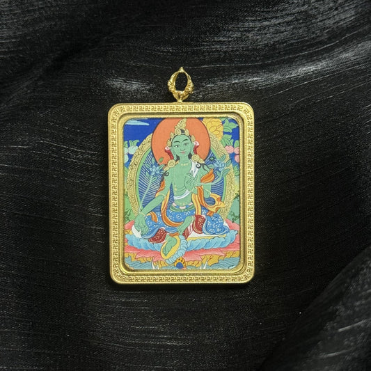 Hand painted Green Tara mini Tibetan thangka pendant in titanium steel frame, traditional Tibetan Buddhist sacred artwork made with mineral pigments.