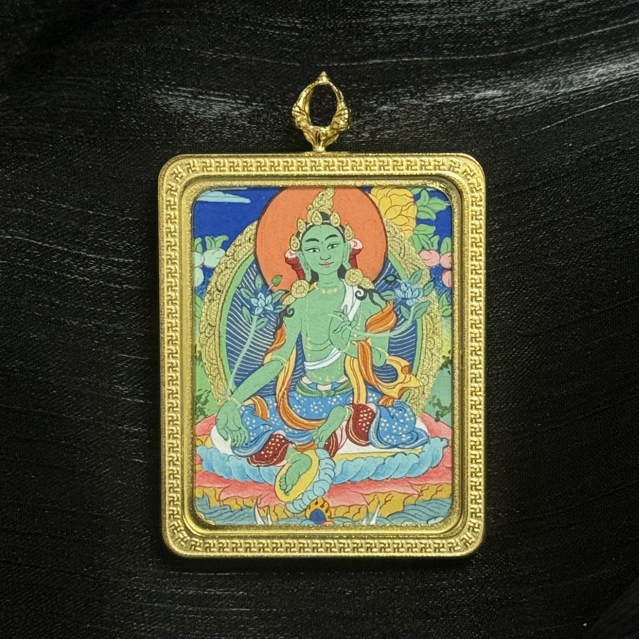 Portable Green Tara Tibetan mini thangka pendant artwork with traditional Buddhist symbolism and mineral pigment painting.