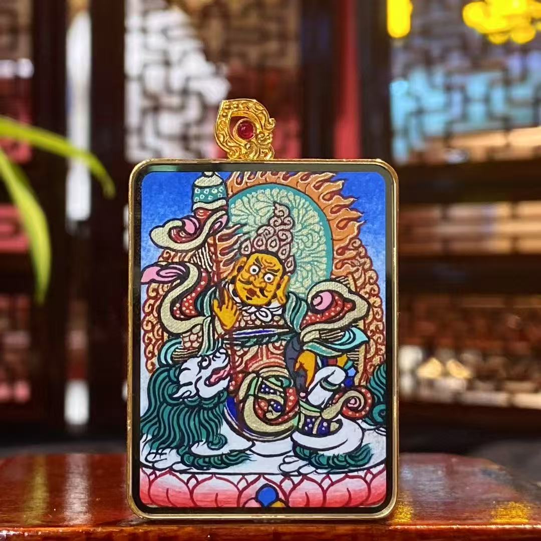 Front view of a double-sided Green Tara Thangka pendant, hand-painted with 18K gold in Rebgong tradition, depicting Green Tara as the embodiment of compassion and wisdom.
