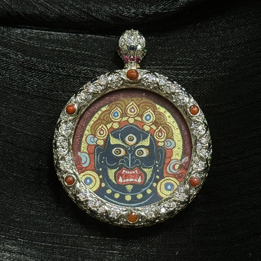Hand-painted Acala Vidyaraja Tibetan mini thangka pendant from Rebgong, featuring red-gold mineral pigments and jewel-inlaid copper frame