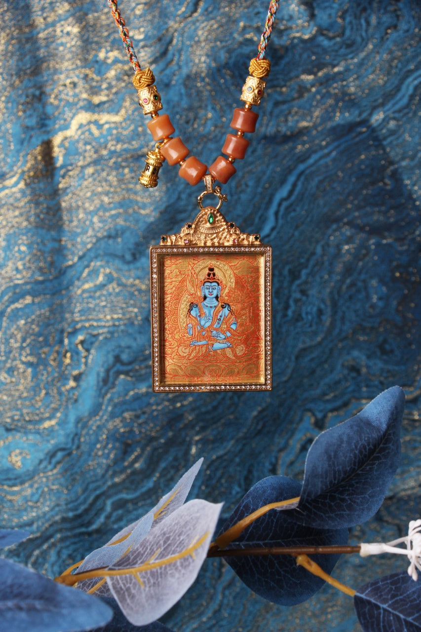 Full display of hand-painted Akashagarbha Bodhisattva mini thangka pendant in Rebgong gold thangka tradition, highlighting balanced iconographic proportions, mineral pigment coloration, and double-sided titanium steel casing