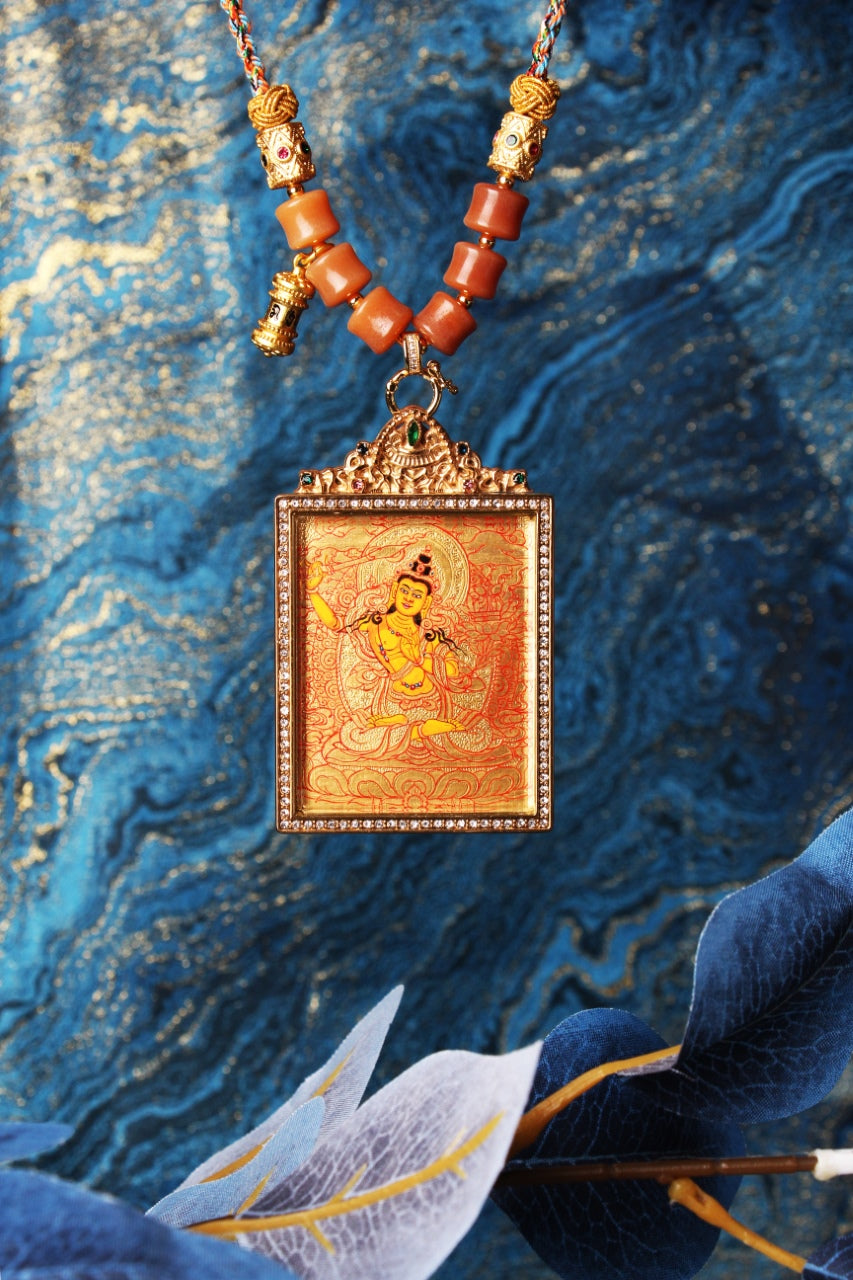 Full display of hand-painted Manjushri Bodhisattva mini thangka pendant in Rebgong gold thangka tradition, highlighting balanced iconographic proportions, mineral pigment coloration, and double-sided titanium steel casing