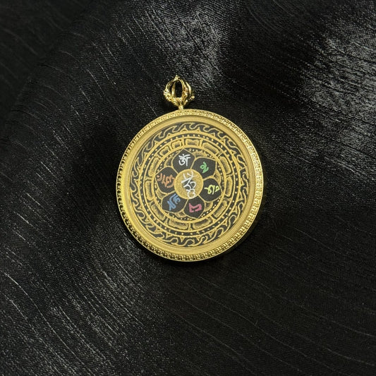 Close-up detail of Om Mani Padme Hum mantra painted in gold powder, layered mineral pigments on lotus petals, fine hand-painted lines