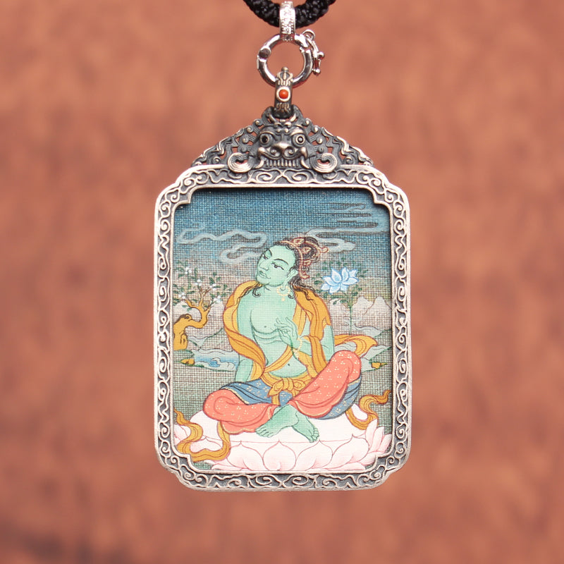 Close-up of hand-painted Tibetan Thangka in Karma Gadri Style featuring 8 Guardian Deities, vibrant lines and details.