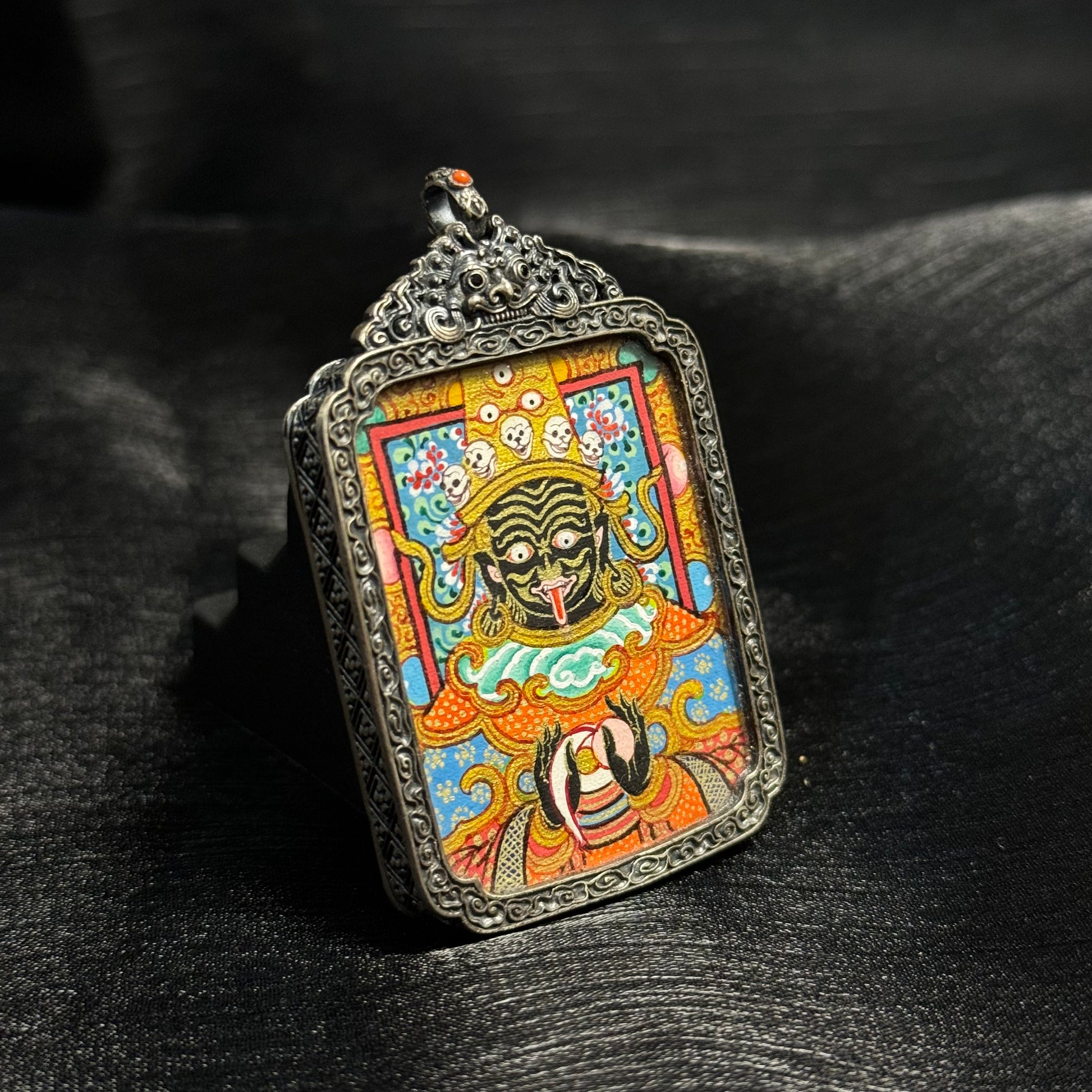 Close perspective highlighting Zaki Lhamo facial features, intricate linework, mineral pigment colors, and traditional Tibetan thangka composition.