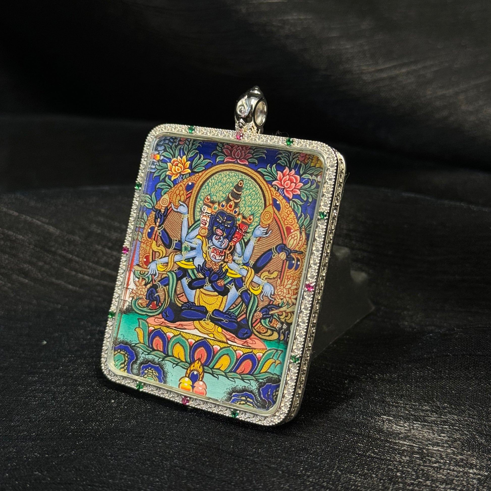 Side perspective of Guhyasamaja Vajra mini thangka pendant featuring traditional Tibetan Buddhist iconography and mineral pigment painting.