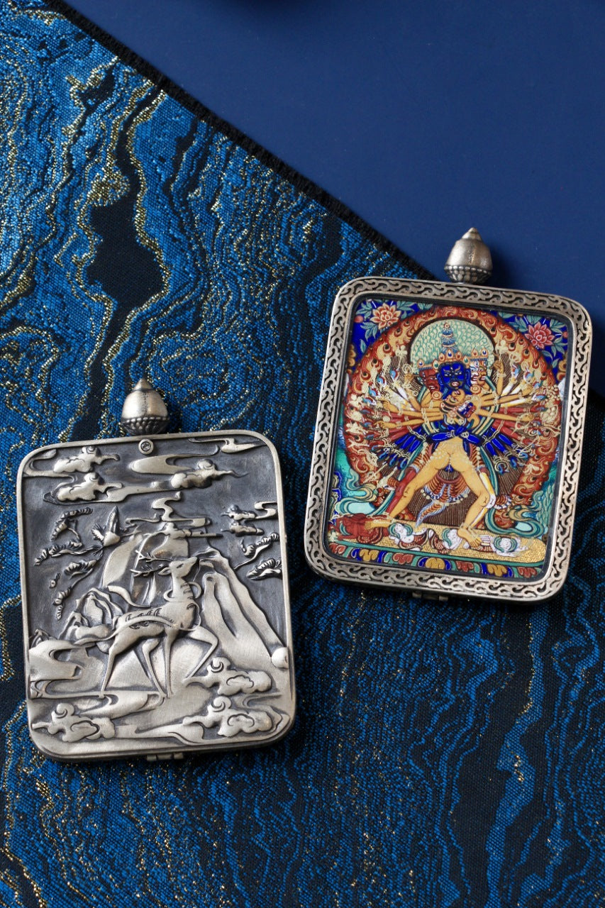 Front and back view of Kalachakra Vajra thangka pendant, featuring a hand-painted Rebgong thangka on the front and an engraved silver case on the back.
