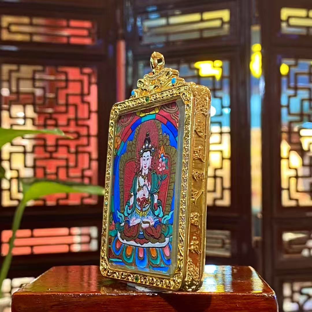 Side detail view of a double-sided Mahāsthāmaprāpta Gawu pendant in a gold-plated copper case, showing craftsmanship and depth, suitable for daily wear and meditation