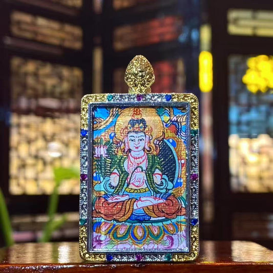 Front view of a hand-painted Mahāsthāmaprāpta (Great Strength Bodhisattva) Gawu pendant in a gold-plated copper case, symbolizing wisdom light and calm, focused awareness