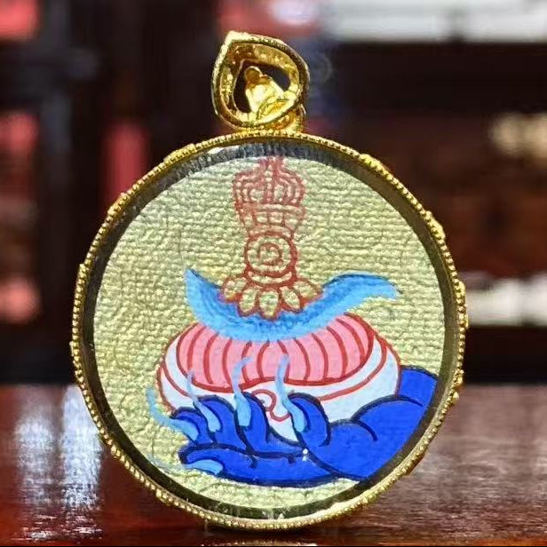 Back view of double-sided Mahakala thangka pendant featuring skull cup and chopper symbols for complete obstacle subjugation