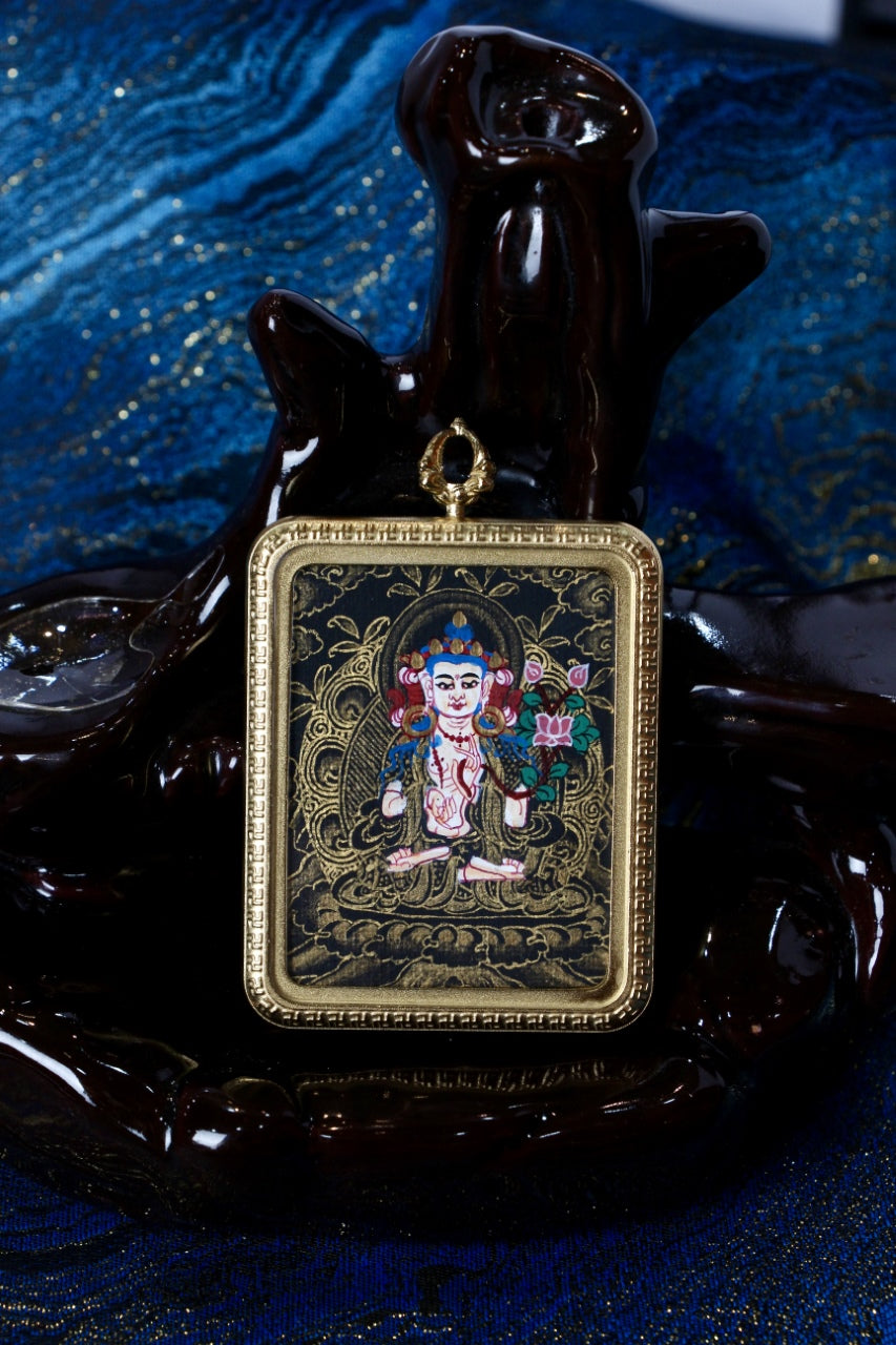 Three-dimensional display of a Mahasthamaprapta Bodhisattva black gold thangka amulet, featuring traditional Newar gold-on-black painting, symbolizing wisdom, inner strength, and spiritual protection.