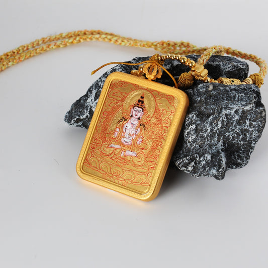 Angled view of the Mahasthamaprapta Bodhisattva mini thangka pendant highlighting the copper frame, gold-ground painting surface, and layered mineral pigment texture.