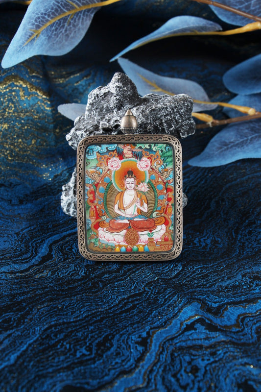 Front view of a Mahasthamaprapta Bodhisattva mini thangka pendant in Qigang style, hand-painted with mineral pigments and set in a silver gawu case.
