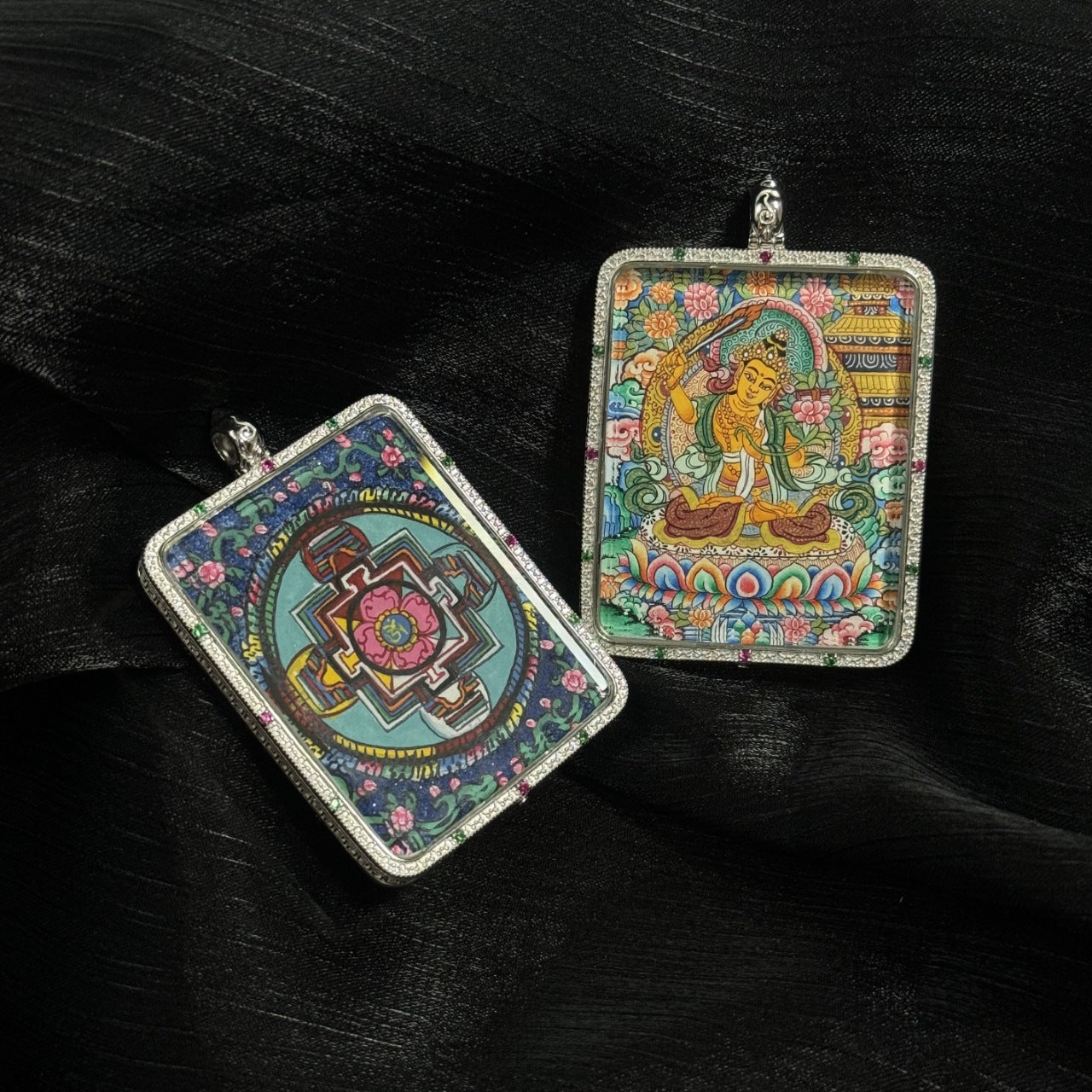 Double-sided Manjushri Bodhisattva mini thangka pendant showing front deity painting and back mandala design in a 925 silver frame with mineral pigment hand-painted details.