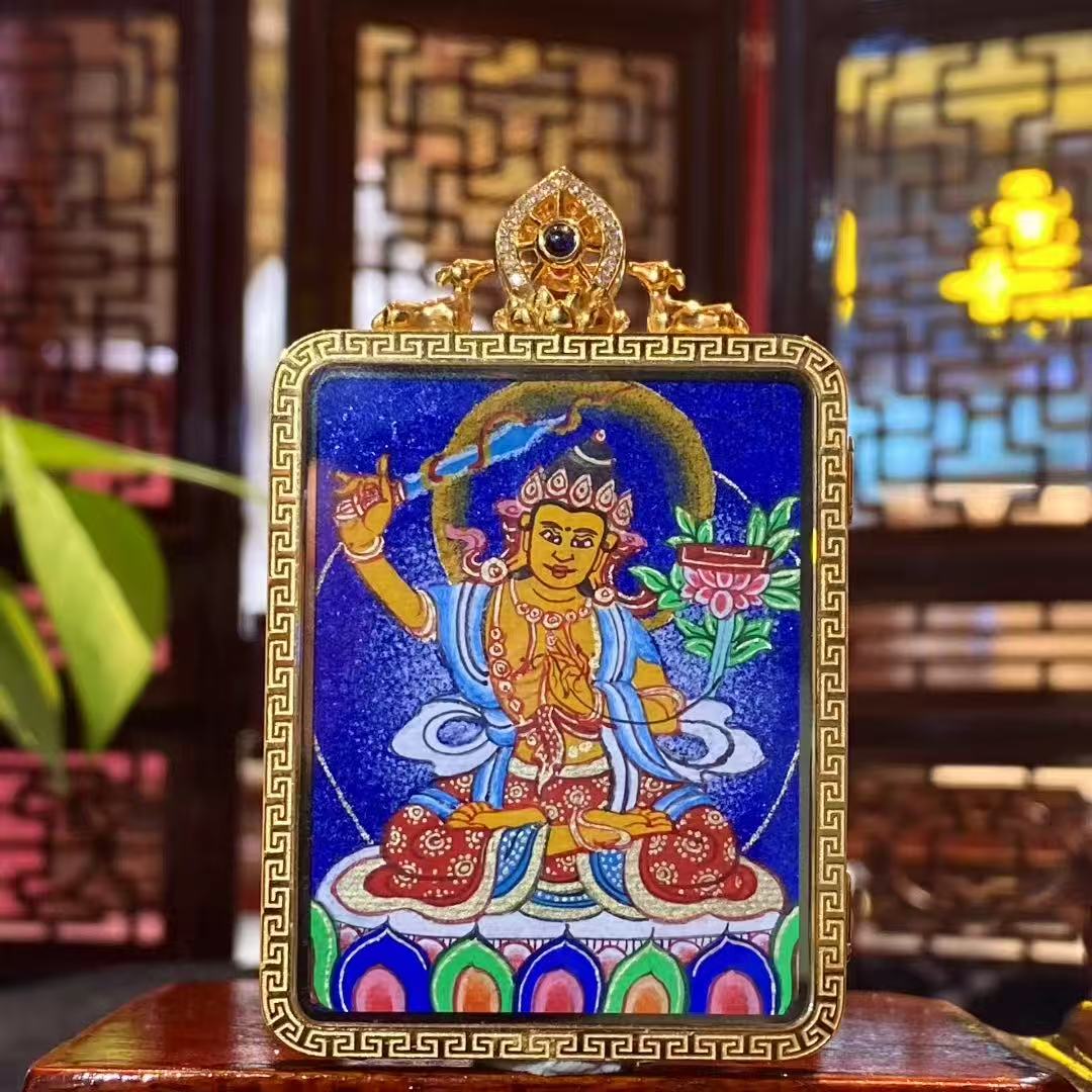 Front view of Manjushri Bodhisattva Tibetan thangka pendant, double-sided hand-painted with 18K gold in Rebgong style, depicting youthful Manjushri holding the wisdom sword and scripture