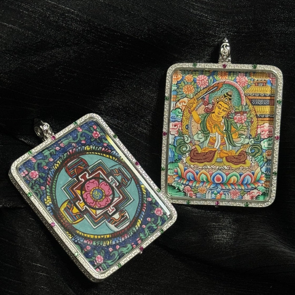 Hand-painted Manjushri Wisdom Buddha pendant with Mandala design, framed in 925 silver plating, a spiritual guardian for Rabbit and Gemini zodiac signs.