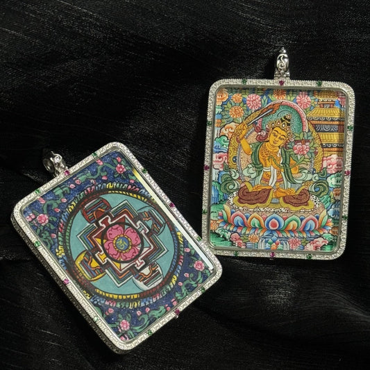 Hand-painted Manjushri Wisdom Buddha pendant with Mandala design, framed in 925 silver plating, a spiritual guardian for Rabbit and Gemini zodiac signs.