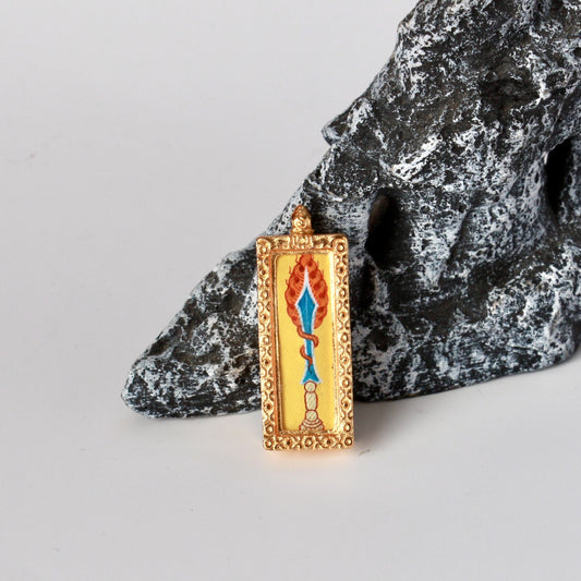Front view of a Manjushri Wisdom Sword mini thangka pendant, fully hand-painted with natural mineral pigments and set in a detailed copper case from Rebgong.