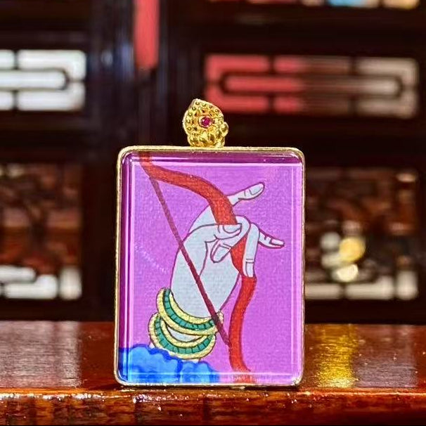 Back view of Marici Thangka pendant featuring the bow-and-arrow symbol, double-sided hand-painted in 18K gold, representing obstacle removal and decisive protection