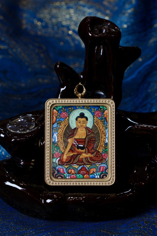 Front view of Nepalese Color Thangka Shakyamuni Buddha pendant, hand-painted mini thangka featuring serene Buddha posture and traditional Newar painting style