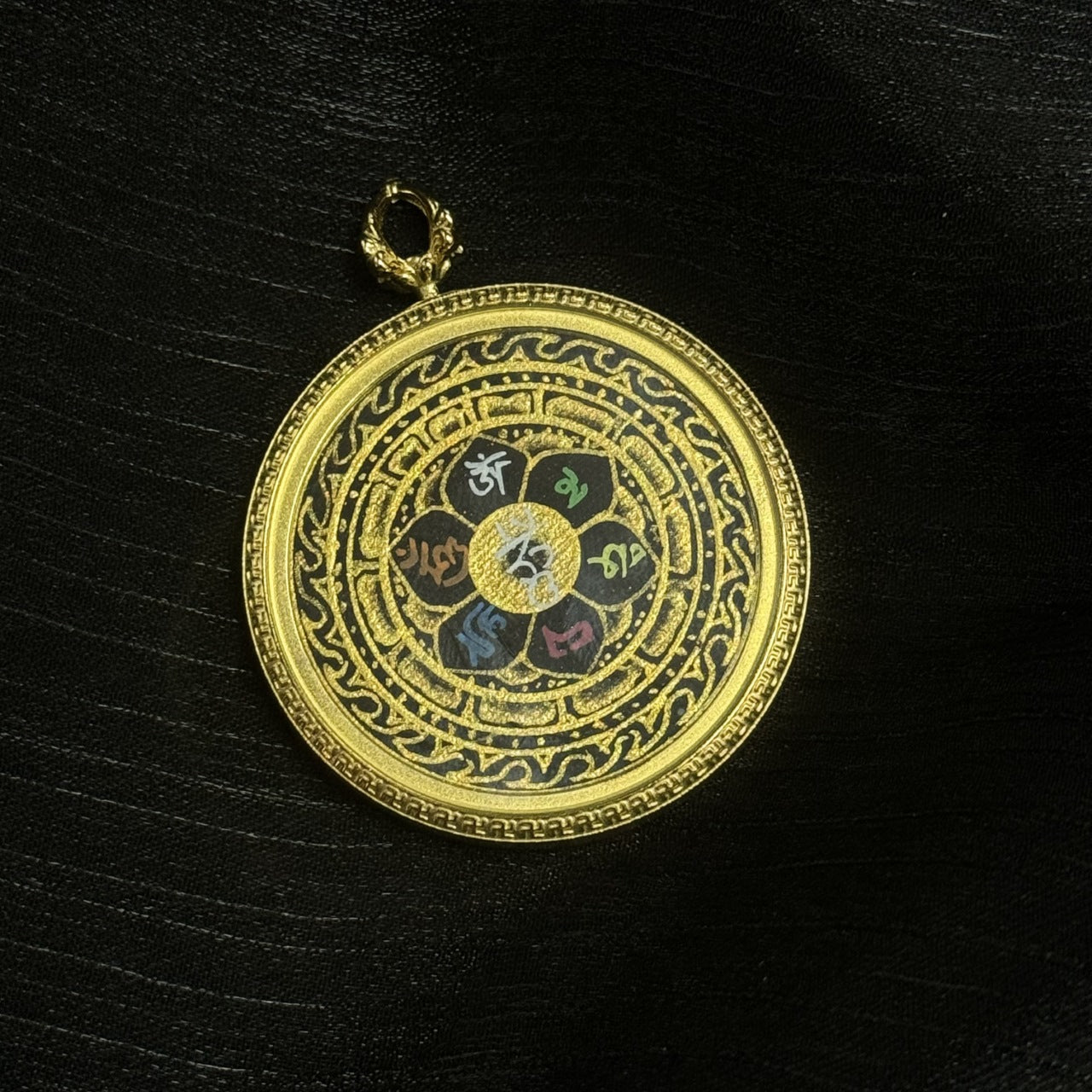 Full view of Nepalese hand-painted mini thangka pendant featuring Six-Syllable Mantra, gold powder details, mineral pigments, durable metal setting