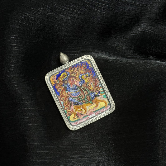Angled view of wrathful Guru Rinpoche thangka pendant, Rebgong Tibetan art, detailed silver casing, vibrant mineral pigments, heirloom-quality piece