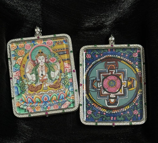 Back view of a sacred mandala mini thangka pendant, hand-painted in traditional Tibetan style with natural mineral pigments, double-sided design paired with Four-Armed Avalokiteshvara, set in 925 sterling silver
