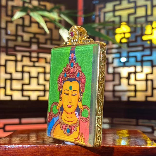 Side view of gold-plated copper Tibetan Gawu amulet with hand-painted Samantabhadra Bodhisattva artwork