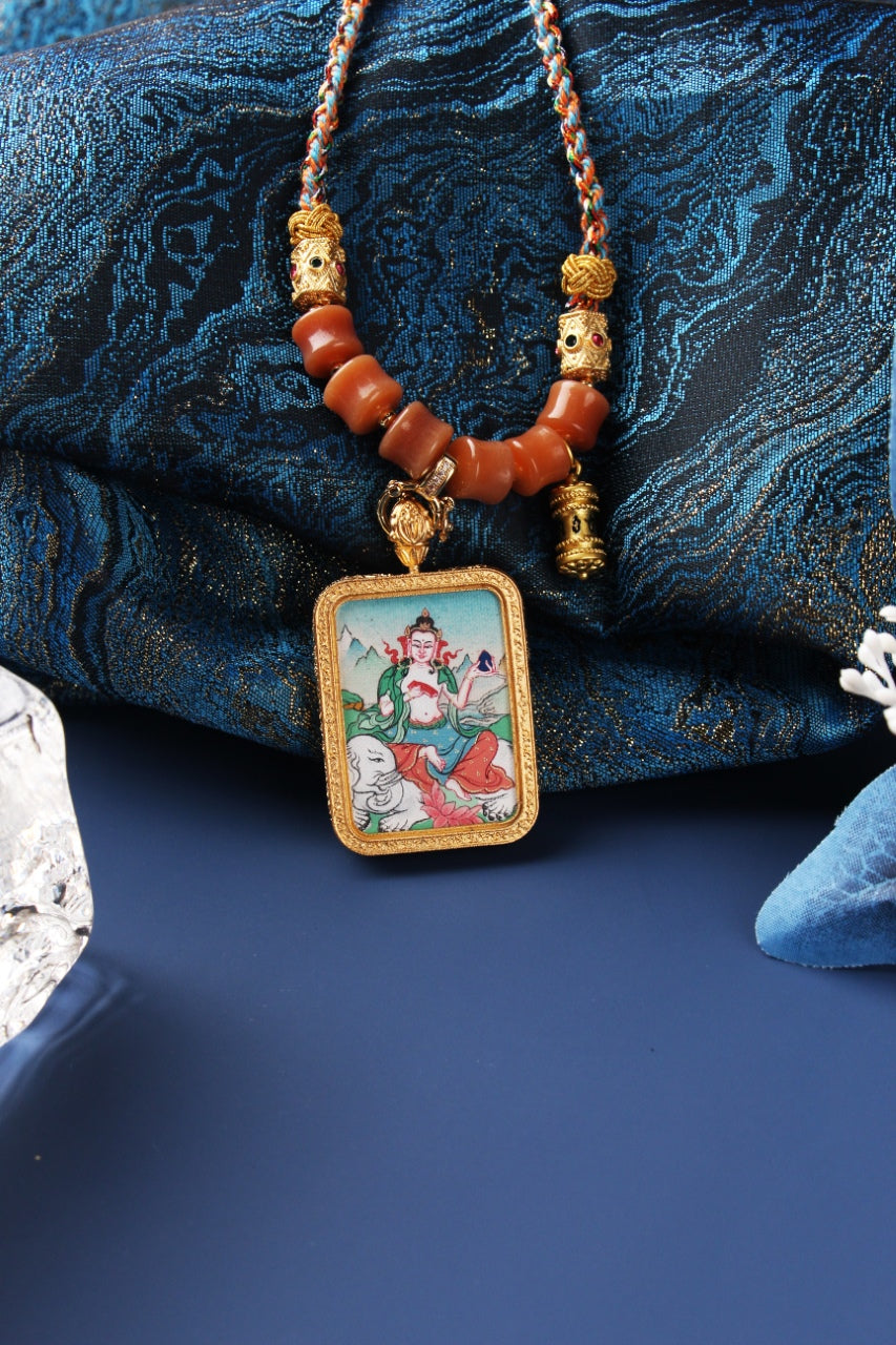 Samantabhadra Bodhisattva mini thangka pendant shown with traditional Tibetan-style beads, metal fittings, and layered necklace composition