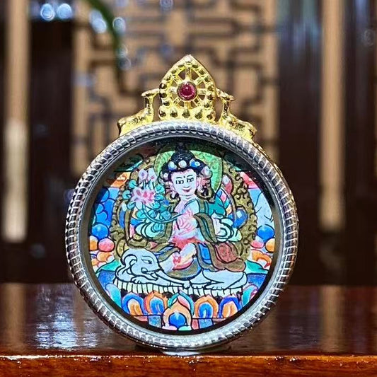 Front view of hand-painted Samantabhadra Bodhisattva mini thangka pendant in a round S925 sterling silver Tibetan Gawu box