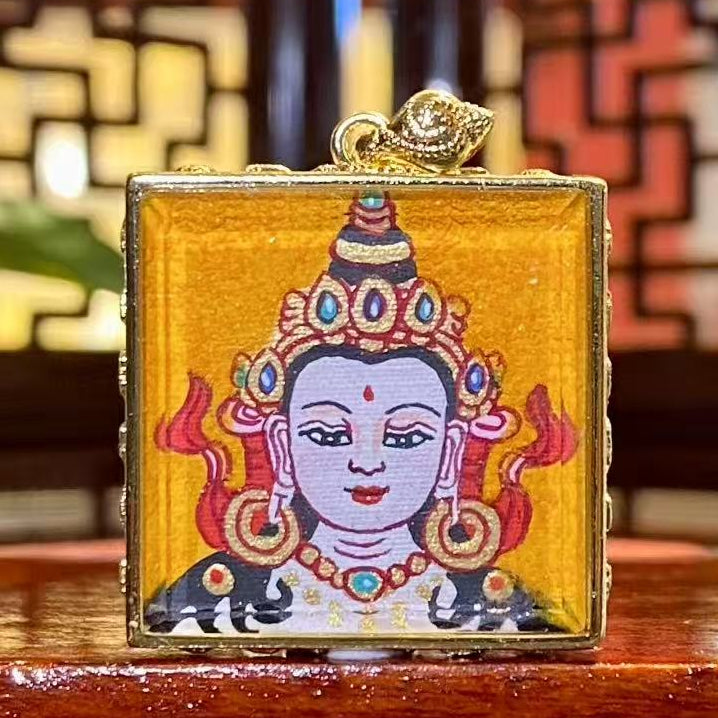 Front view of hand-painted Samantabhadra Bodhisattva mini thangka pendant in a gold-plated Tibetan Gawu box