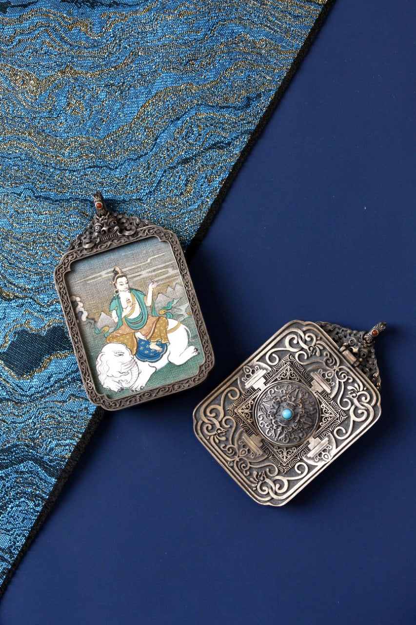 Front and back view of Samantabhadra Bodhisattva mini thangka pendant, hand-painted with mineral pigments and set in a vintage silver case, Tibetan origin