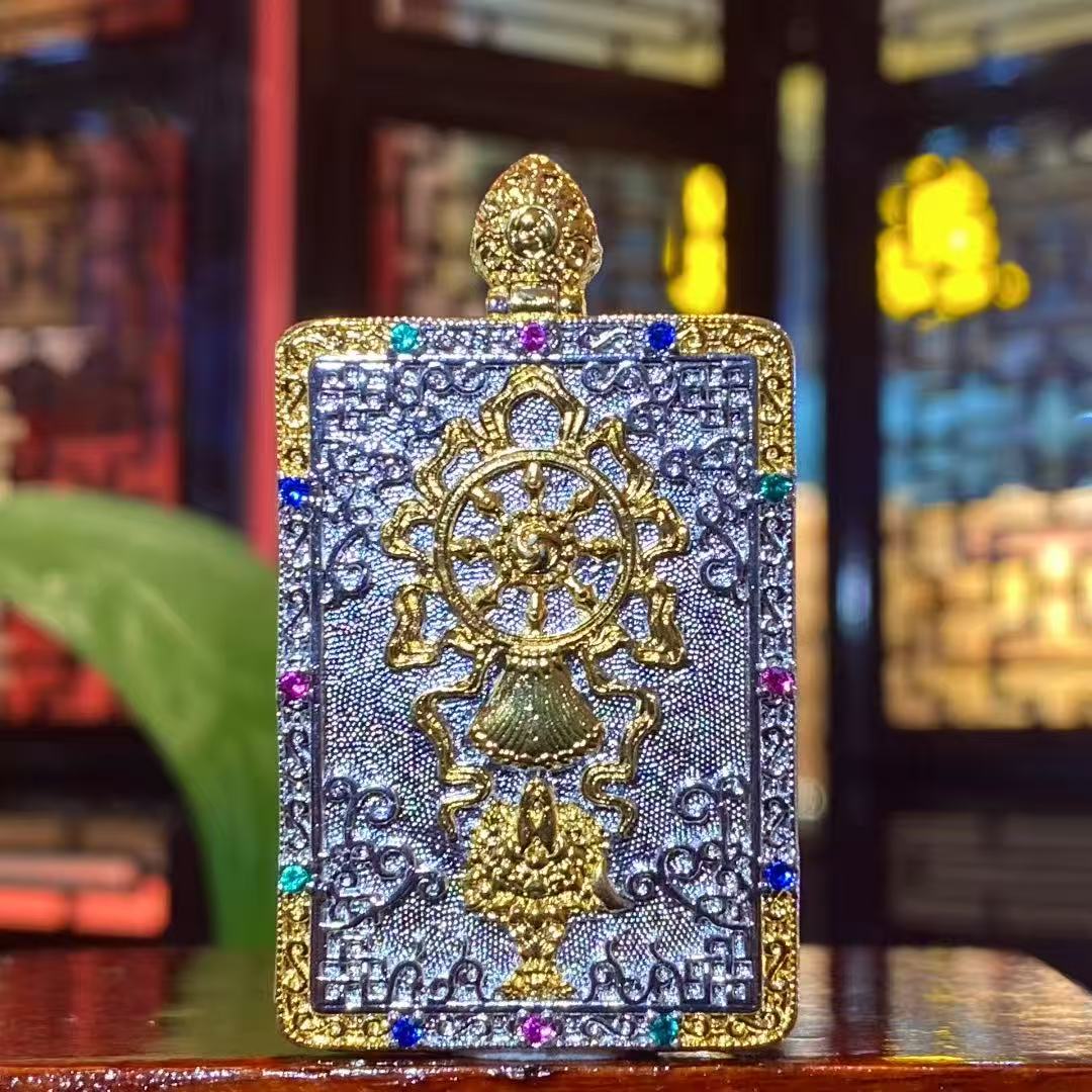 Back view of Samantabhadra Bodhisattva thangka pendant featuring symbolic sacred motifs on a gold-plated Tibetan Gawu box