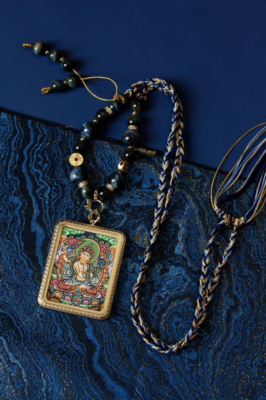 Full view of Samantabhadra mini thangka pendant necklace with braided cord and bead details