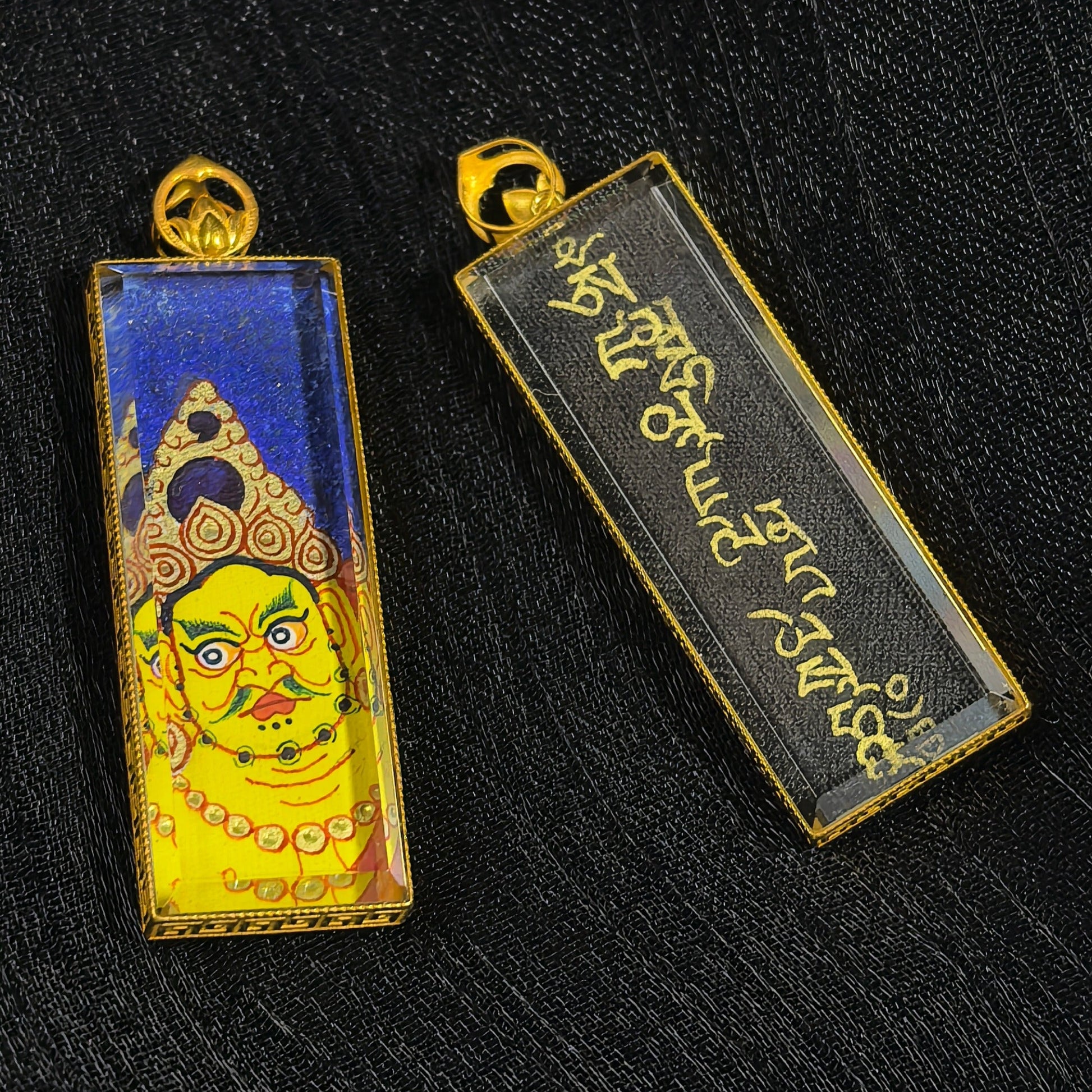 Side View of Rebgong Lama Artist Buddha Head Pendant with 18K Gold Inlay and Sapphire Mirror Surface