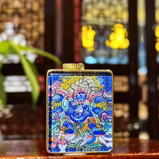 Front view of Six-Armed Mahakala Gau pendant, hand-painted with 18K gold in the Rebgong Tibetan tradition
