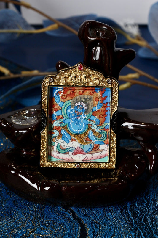 Front view of Six-Armed Mahakala Thangka pendant, fully hand-painted with mineral pigments, set in a black gold double-sided metal frame, Rebgong Tibetan art