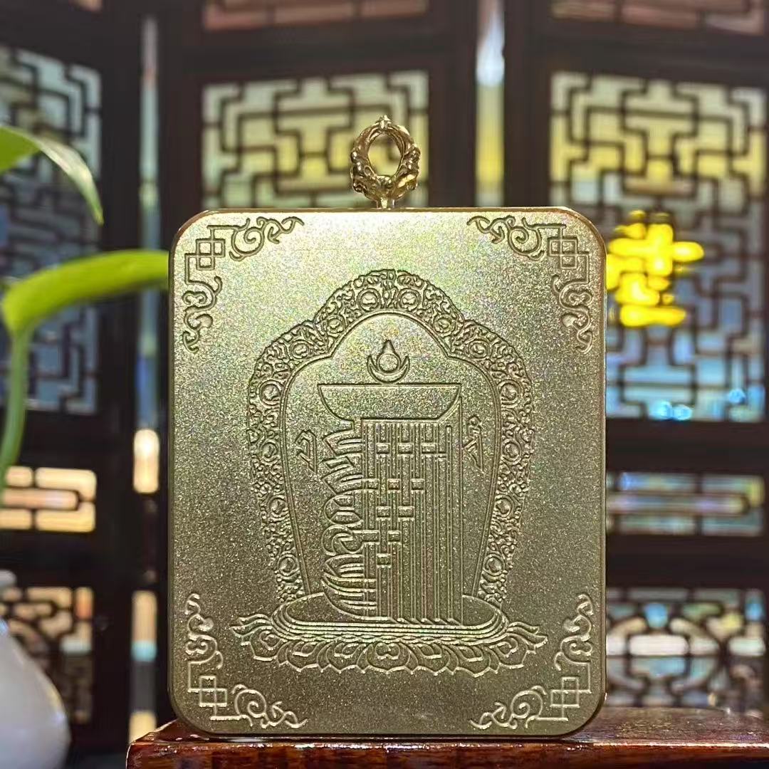 Back view of Four-Armed Avalokiteshvara thangka pendant engraved with the Tenfold Sovereignty symbol on the Ghau box