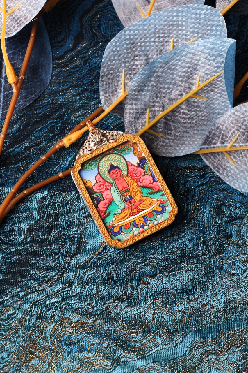 Angled view of Amitabha Buddha thangka pendant, traditional Tibetan Buddhist composition, Rebgong high-grade series with detailed line work and layered mineral colors