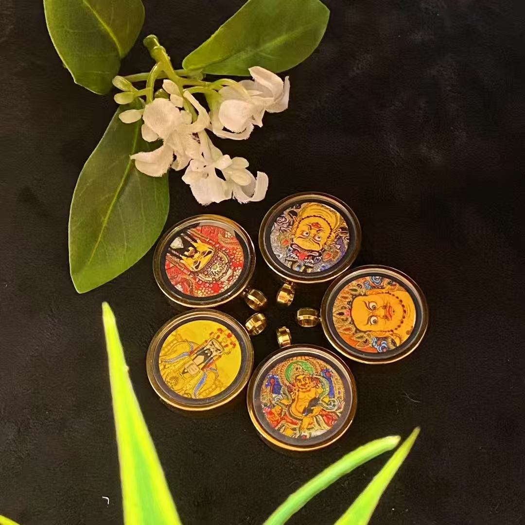 Side view of titanium steel gau box pendant housing hand-painted gold-outlined thangka artwork