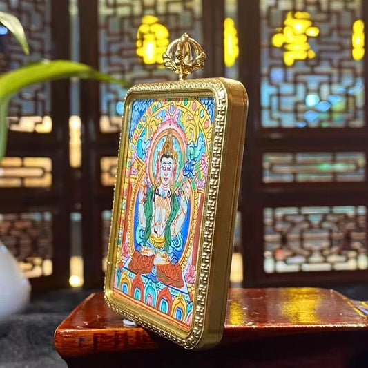 Side view of Four-Armed Avalokiteshvara thangka pendant showing the titanium steel Ghau box craftsmanship