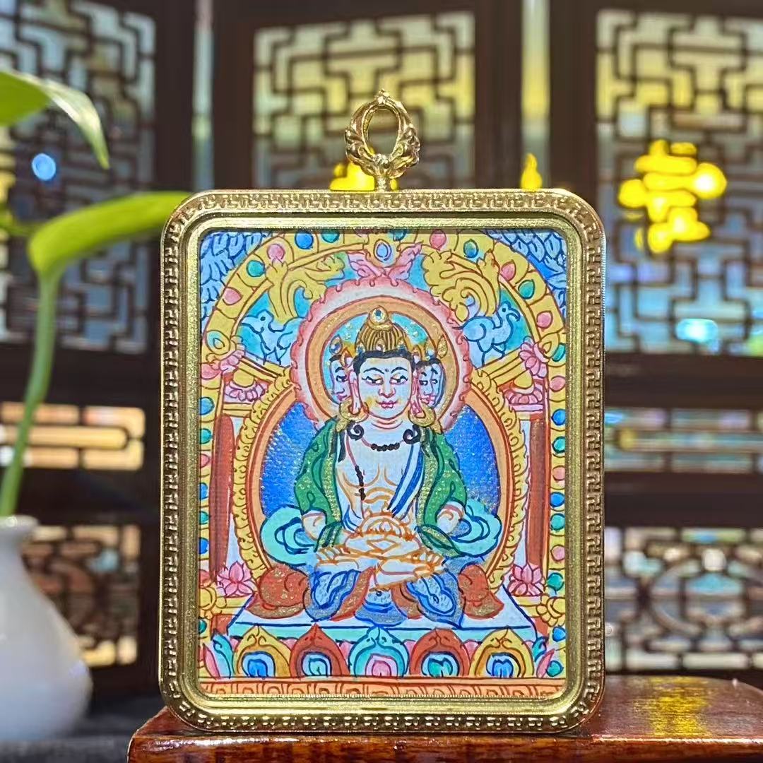 Hand-painted Vairocana Buddha large mini thangka pendant in a titanium steel Gawu box, front view showing the Great Sun Buddha, 56×46mm