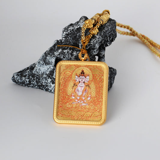Front view of a Vairocana Buddha mini thangka pendant, fully hand-painted with mineral pigments in Rebgong gold thangka style, set in a copper case with intricate red and gold detailing.