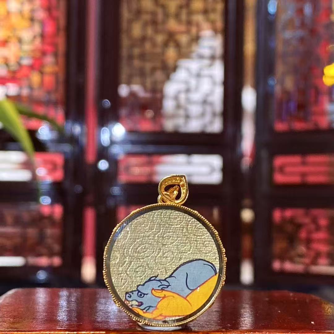 Back view of Gau Thangka pendant featuring the Wealth-Spouting Mouse (Nyule), hand-painted in Rebgong style, symbolizing continuous and non-depleting abundance