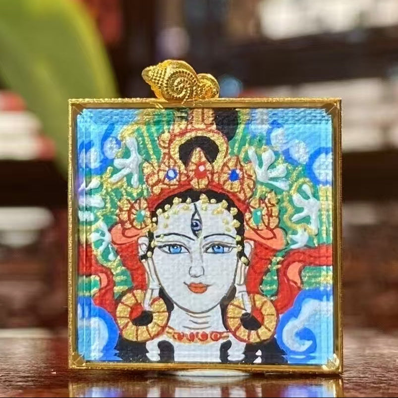Front view of White Tara (Sitatara) Tibetan mini thangka pendant, double-sided hand-painted in 18K gold, Rebgong tradition