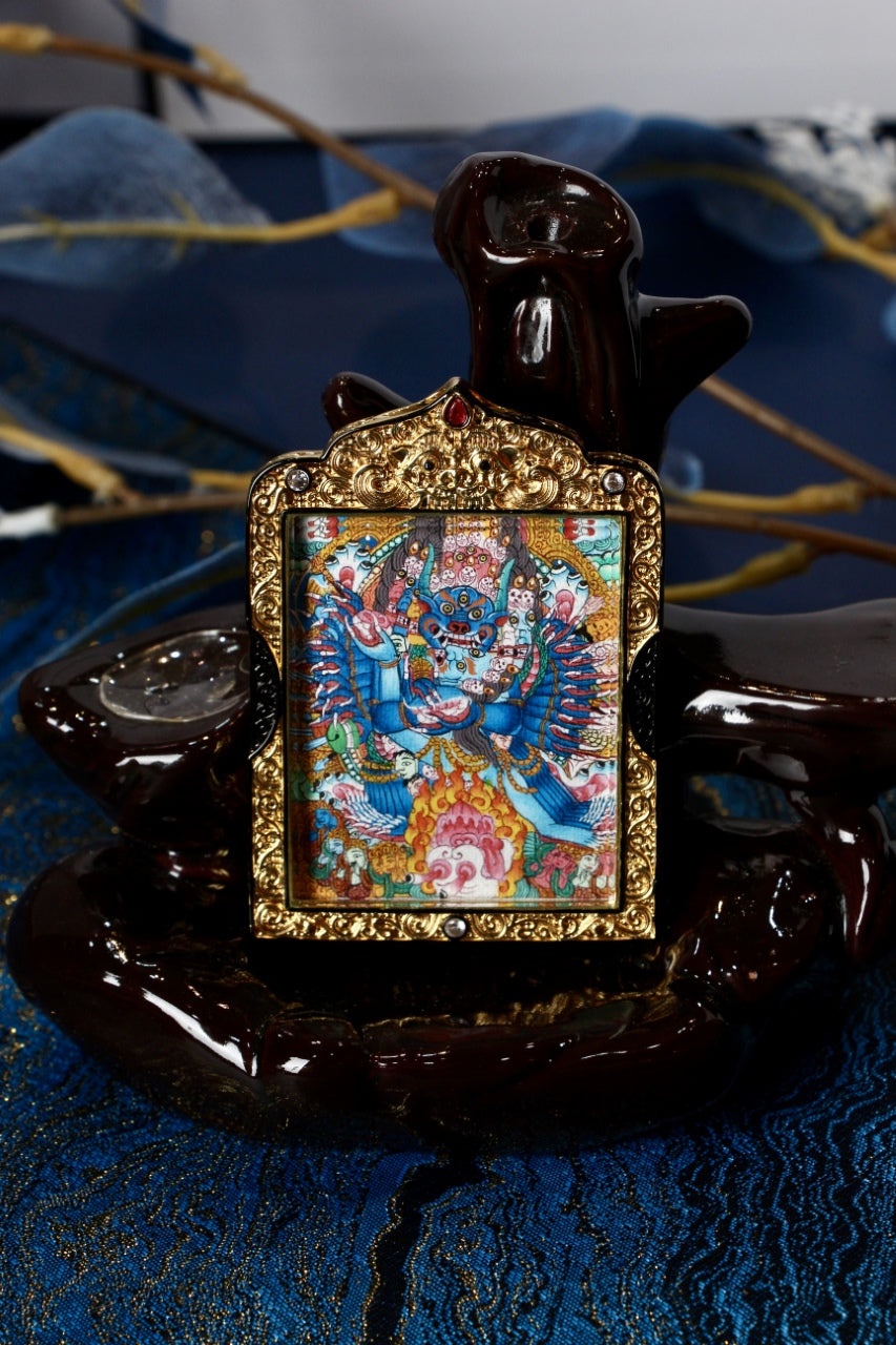 Mini Yamantaka thangka pendant hand-painted in Rebgong style with mineral pigments, double-sided copper gawu, 4×5 cm